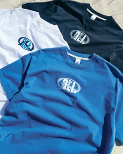 Rusty Oli X Badge Tee | Mens Tees