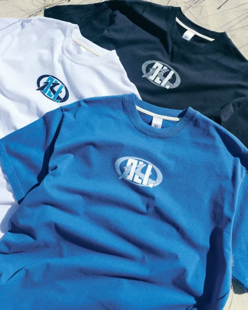 Rusty Oli X Badge Tee | Mens Tees